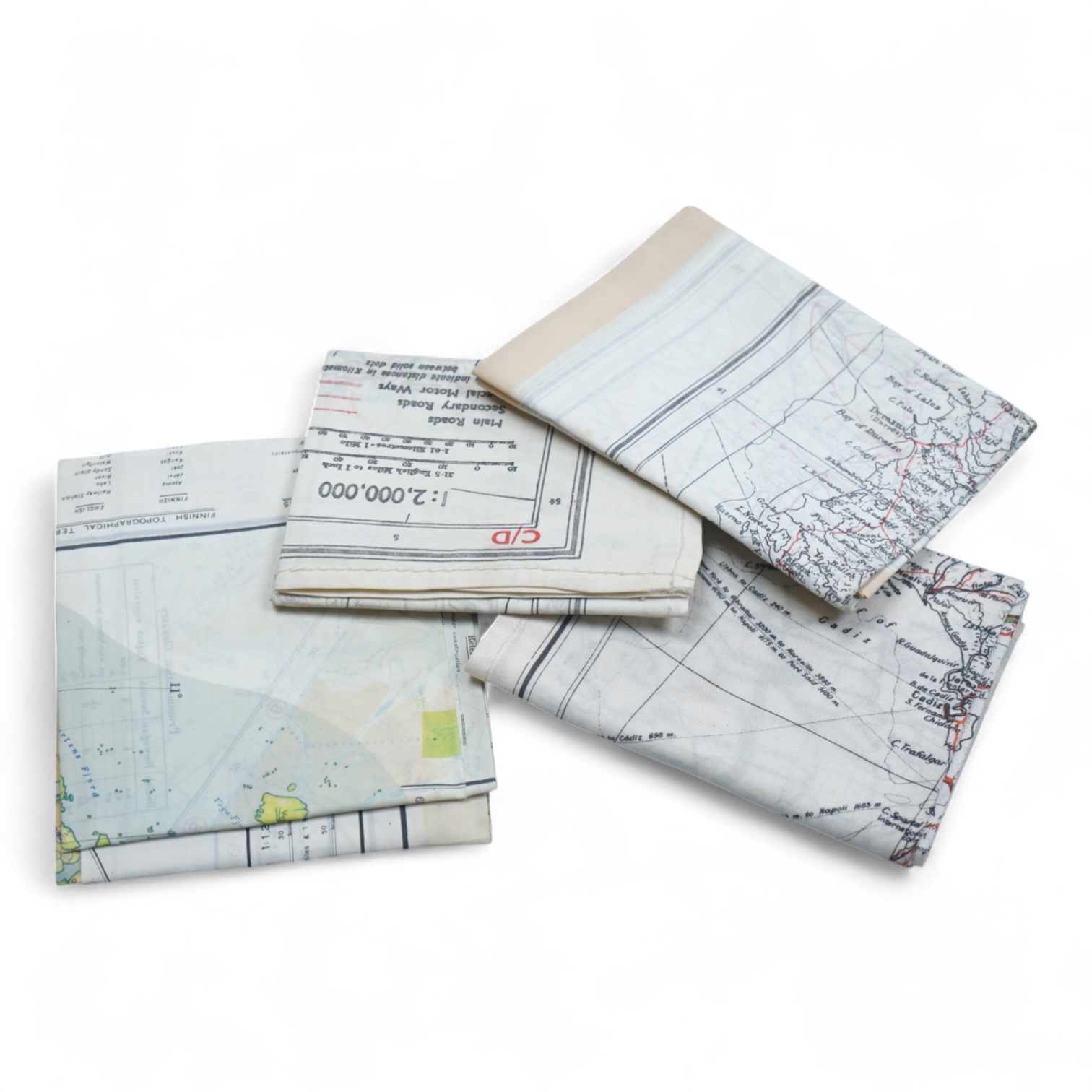 Four ‘escape’ style maps printed on silk type material, three printed double-sided; North Norway, 47x49cm, parts of Italy and Greece, 53x62cm, parts of France, 44x53cm, and a single sided map of part of the Mediterranean